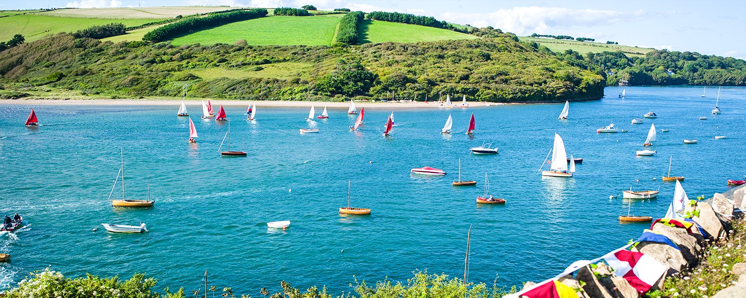 Boats sailing on the River Avon at Bantham