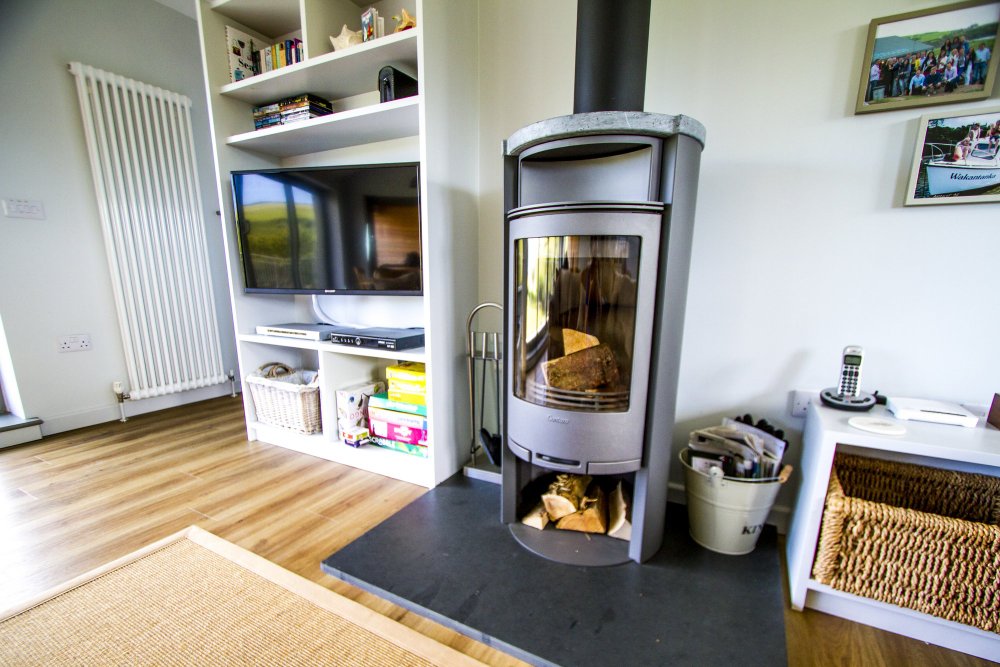 Wood burner in living area of main house